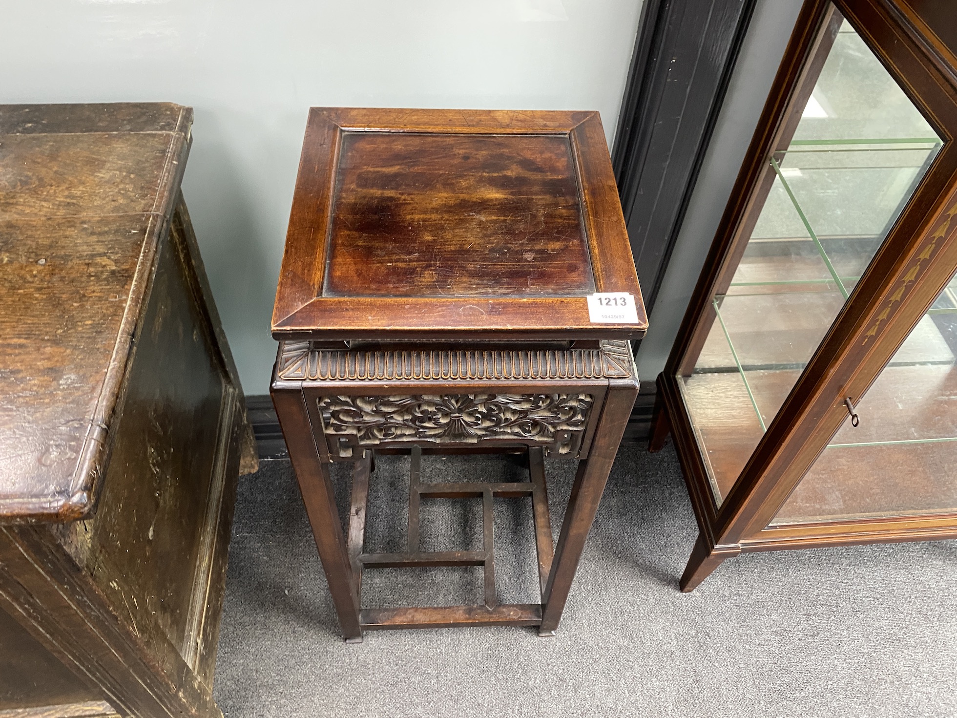 An early 20th century Chinese carved hardwood vase stand, width 33cm, depth 33cm, height 76cm
